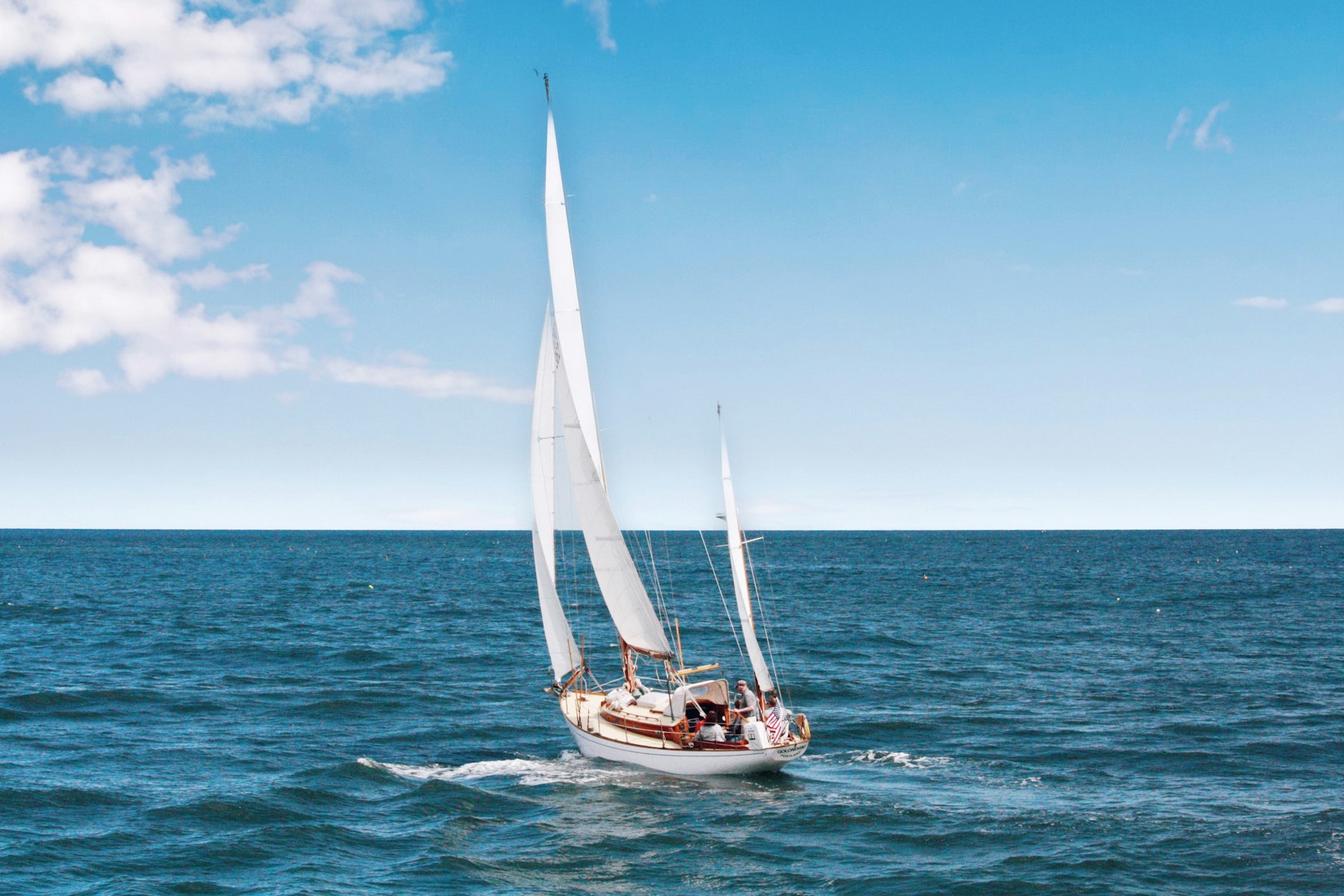 Sailboat under mainsail and genoa, example photo
